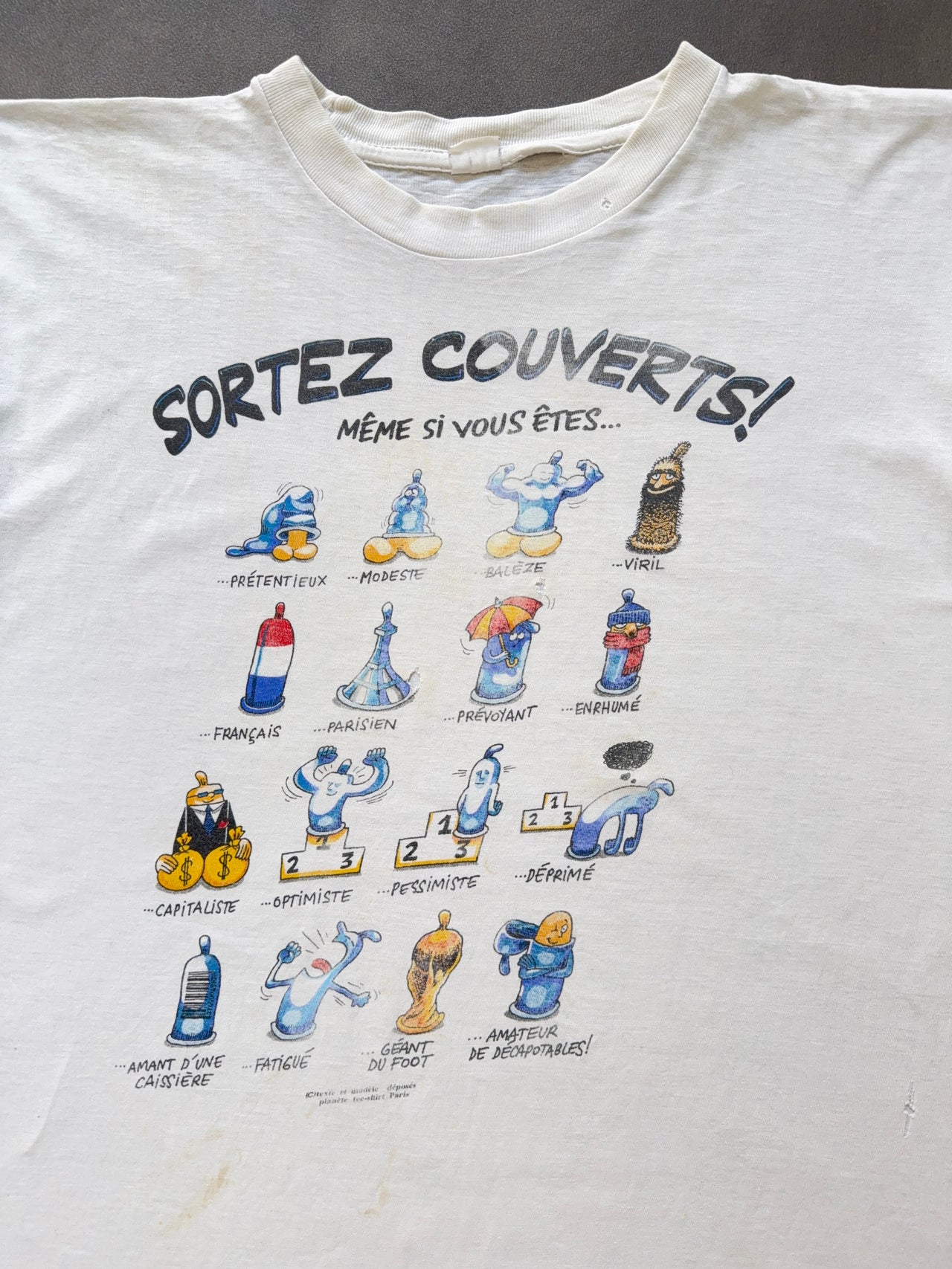 1980s Condoms meme faded tee (L)