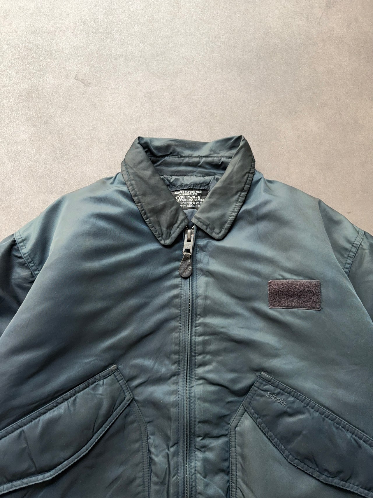 1980s CWU-45 faded Blue Bomber (L)