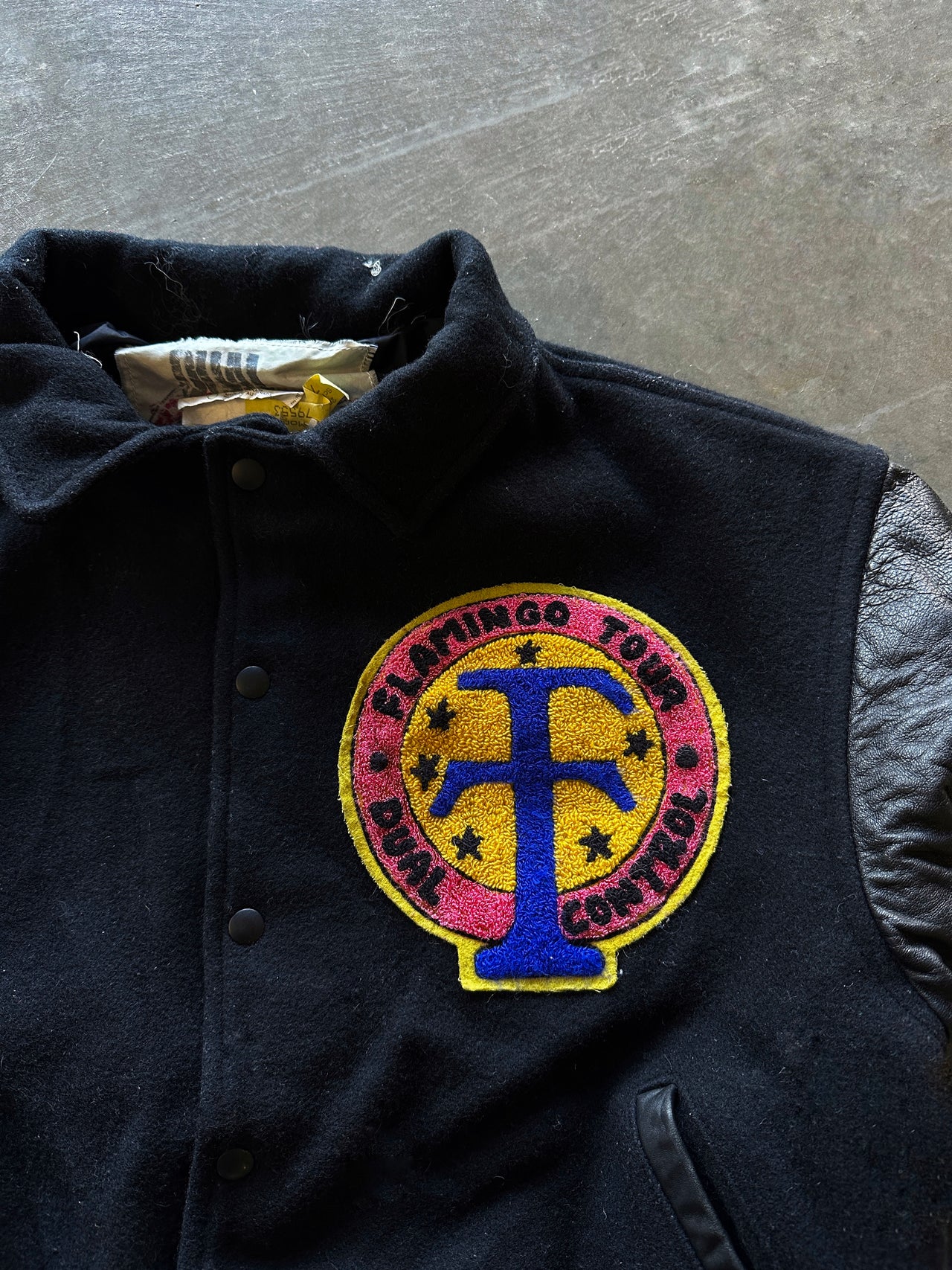 90s “Flamingo Tour” varsity jacket (M)