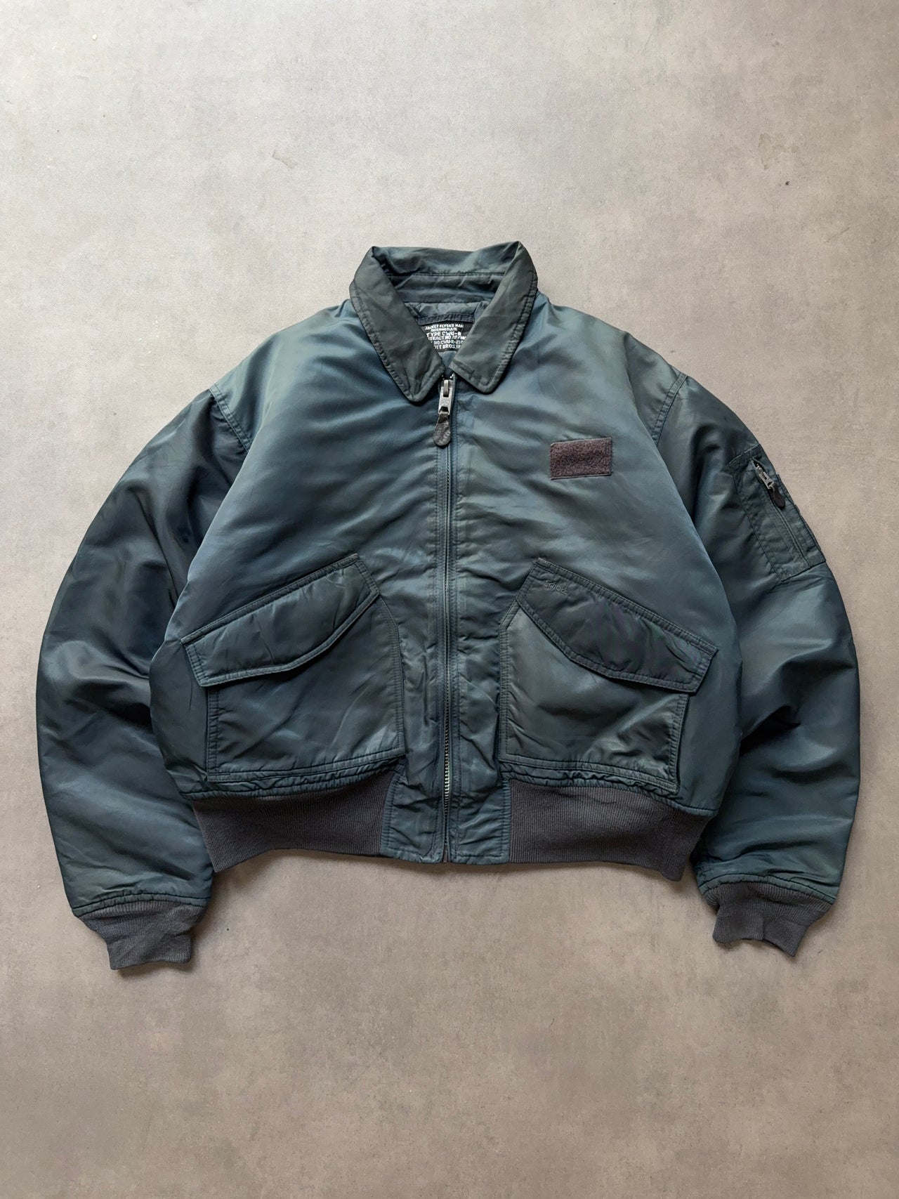 1980s CWU-45 faded Blue Bomber (L)